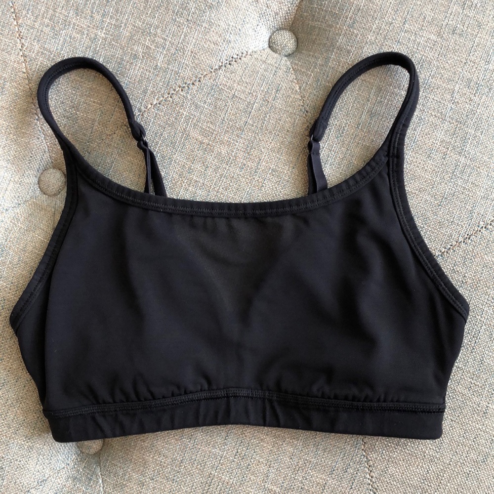 Athleta black sports bra with from mesh panel